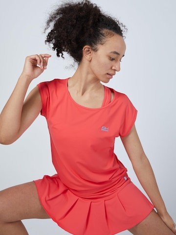 SPORTKIND - Camiseta funcional 'Loose Fit' en naranja
