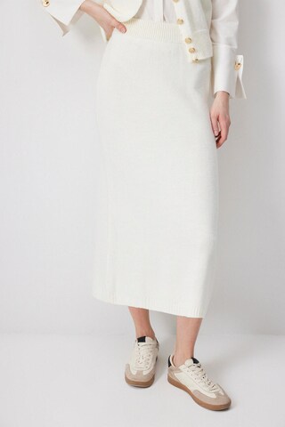 Touche Prive Kostuum in Beige