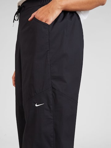 Nike Sportswear Wide leg Sportbyxa i svart