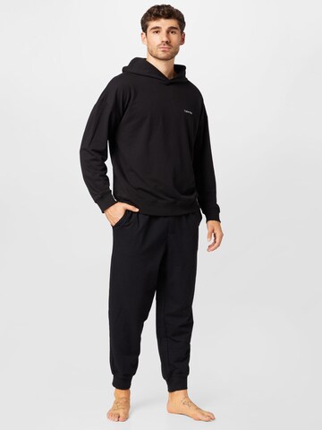 Calvin Klein Дънки Tapered Leg Панталон в черно