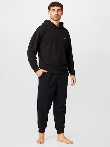 Calvin Klein Tapered Trousers in Black