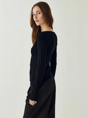 Noella - Top ' N-Melvie ' en negro