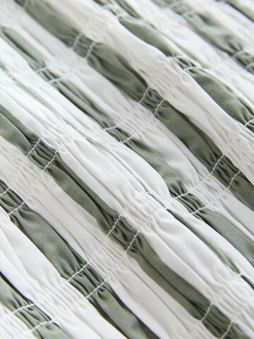 Top di Next in verde