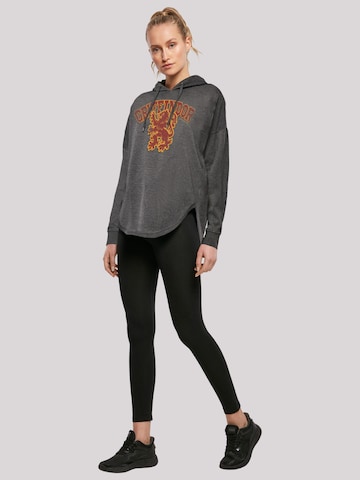 Sweat-shirt 'Harry Potte Gryffindor Sport Emblem' F4NT4STIC en gris