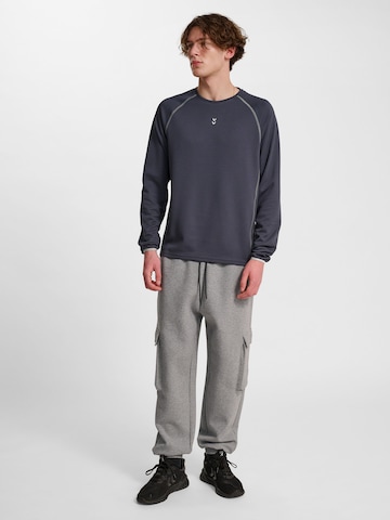 T-Shirt fonctionnel Hummel en gris