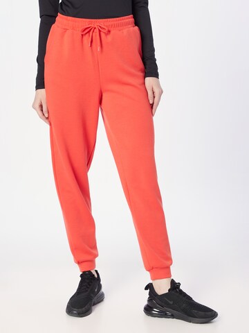 Effilé Pantalon de sport ONLY PLAY en rouge : devant