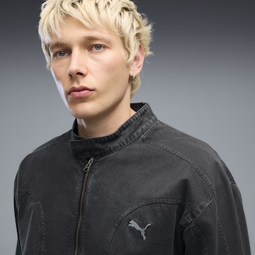 PUMA Trainingsjack 'FUTURE.PUMA.ARCHIVE T7' in Zwart