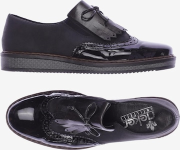 Rieker Flats & Loafers in 40 in Black: front