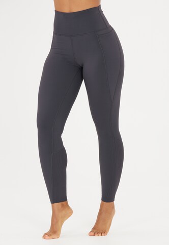 Athlecia Skinny Sportbroek 'Aliya' in Grijs: voorkant
