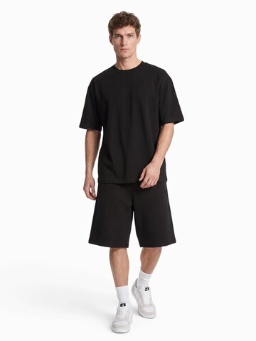 Baggy Pantaloni 'SCUBA' de la Bershka pe negru
