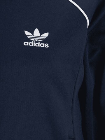 ADIDAS ORIGINALS Övergångsjacka 'Adicolor Classics Sst' i blå