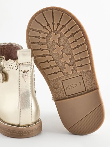 Bottes Next en or