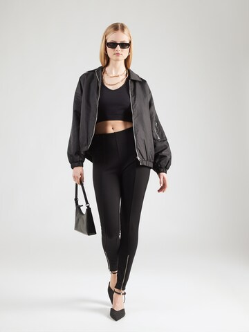 ABOUT YOU Skinny Leggingsit 'Miles' värissä musta