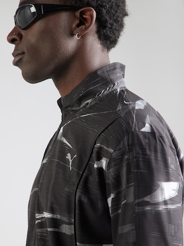PUMA Sportjacka 'Run Velocity' i svart