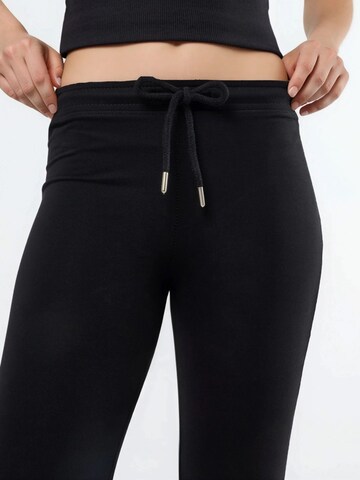 Busem Flared Pants in Black