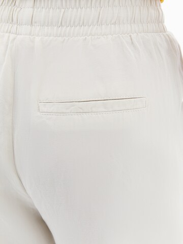 Loosefit Pantaloni con pieghe di OXXO in beige
