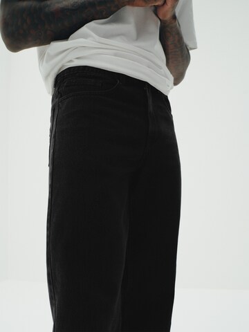 Sinned x ABOUT YOU Loosefit Jeans 'Hennes' in Zwart