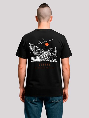 T-Shirt 'Escape Discover the World Town Train Station' F4NT4STIC en noir : devant