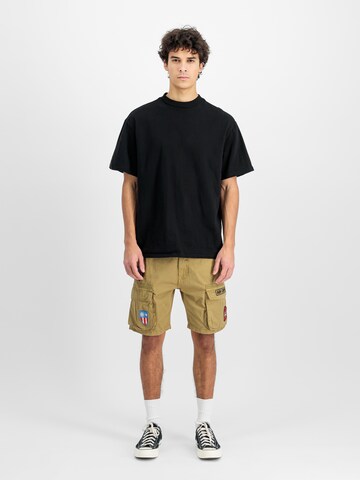 Slimfit Pantaloni sportivi di ALPHA INDUSTRIES in beige