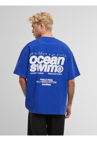 Another Cotton Lab Футболка 'Ocean Swim' в Синий