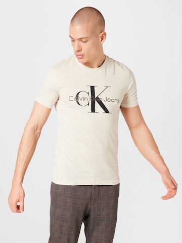 Calvin Klein Jeans Paita värissä beige: edessä