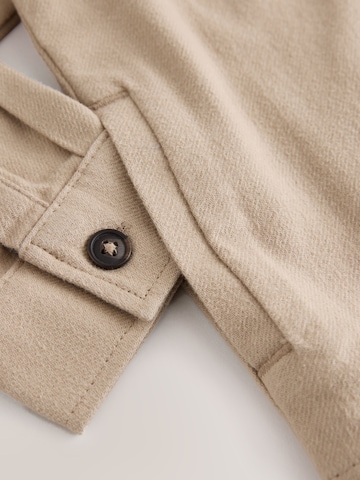 Next Övergångsjacka i grå