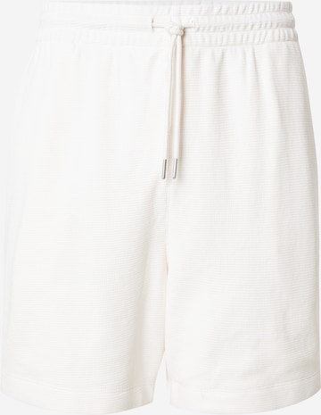 balta Calvin Klein Jeans Laisvas Kelnės: priekis