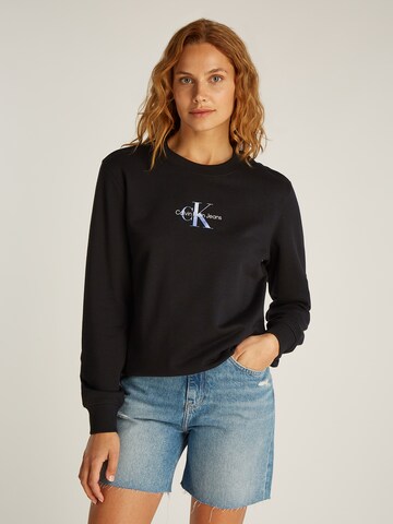 Sweat-shirt Calvin Klein Jeans en noir : devant