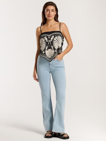 Top di Shiwi in nero