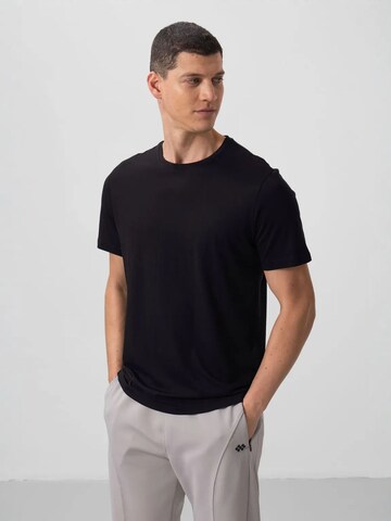 Tommy Life T-Shirts in Schwarz