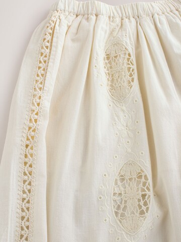Next - Pierna ancha Pantalón en beige
