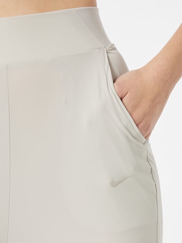 Effilé Pantalon de sport 'Bliss Luxe' NIKE en gris