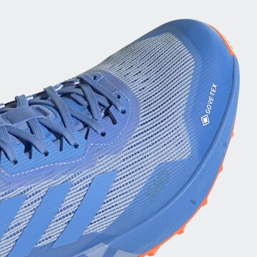 Chaussure de course 'Agravic Flow' ADIDAS TERREX en bleu