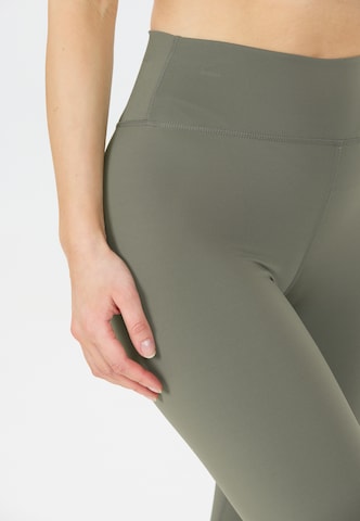 Athlecia Skinny Workout Pants 'FRANZ' in Green
