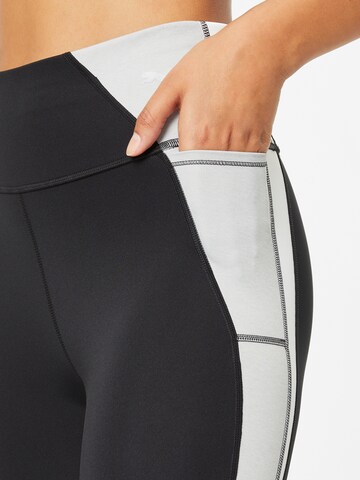 PUMA Skinny Sportbroek in Zwart