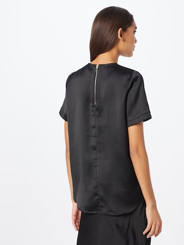 River Island - Blusa en negro