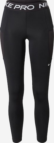 NIKE Skinny Workout Pants in Black: front