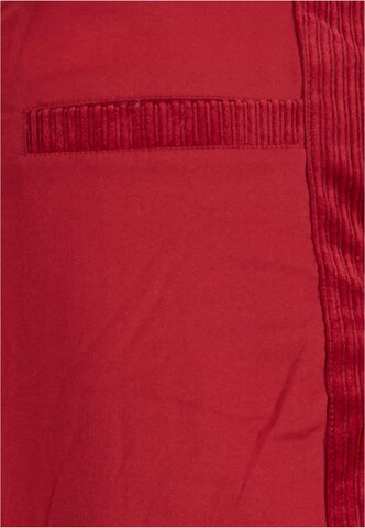 Giacca invernale 'Retro Corduroy' di Karl Kani in rosso