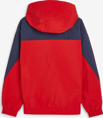 TOMMY HILFIGER Between-Season Jacket 'Hero Popover' in Red