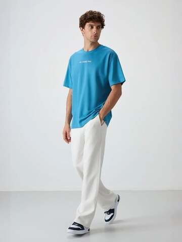Tommy Life T-Shirts in Blau