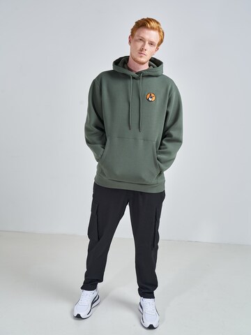 ABOUT YOU x Swalina&Linus Sweatshirt 'Elia' in Green