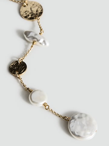 Lanțuri 'MONICA' de la MANGO pe auriu