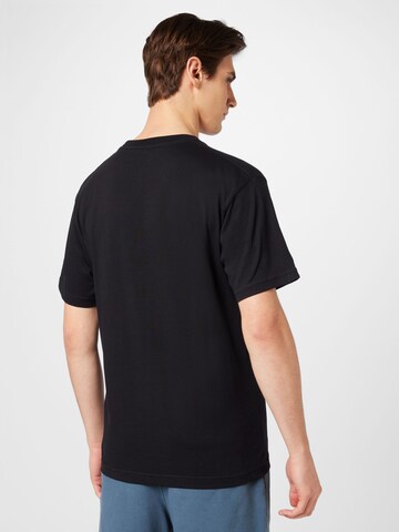 DC Shoes - Camiseta funcional 'STAR FILL' en negro