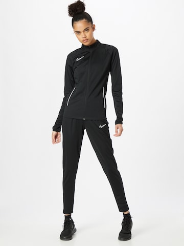 NIKE Sportsdragt i sort: forside