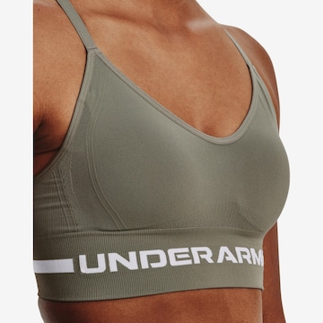 Bustino Reggiseno sportivo di UNDER ARMOUR in verde