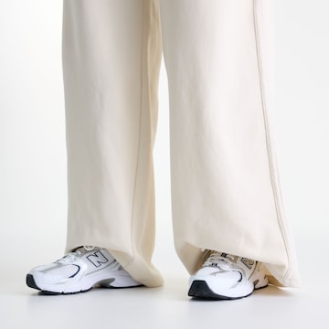 new balance Wide leg Broek 'Brushed Coastal Fleece Pant' in Wit