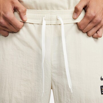 NIKE Tapered Outdoor Pants 'FC' in Beige