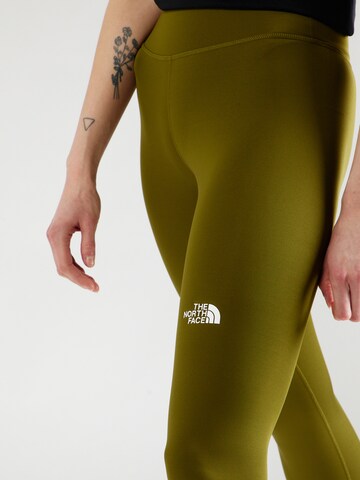 THE NORTH FACE Skinny Športne hlače 'FLEX' | zelena barva