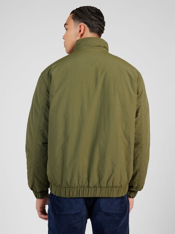 Veste mi-saison Tommy Jeans en vert