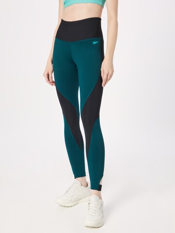 Reebok Skinny Workout Pants in Green: front